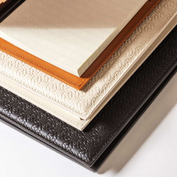 Stacked 3 Monogram leather notepad holders by Giobagnara x Elie Saab with padded cover and ivory sheets