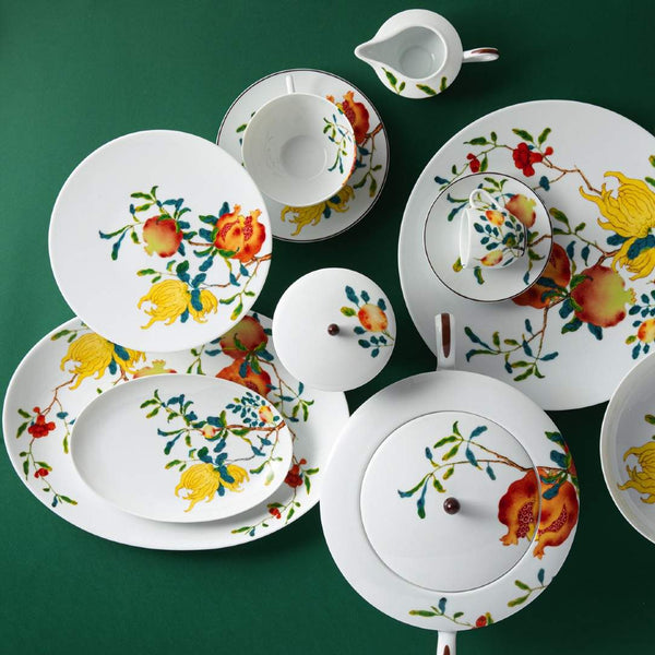 Styled Harmonia luxury porcelain oval platter with fruit and floral motifs inspired by Chinese imperial art by Raynaud