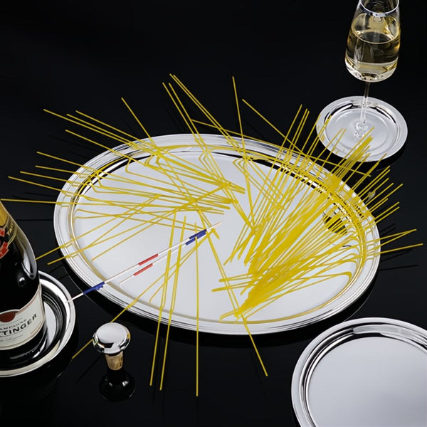 Oval Verona tray silver-plated by Sonja Quandt with pasta, wine bottle, and glass on a black background
