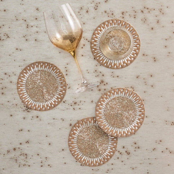 Palisade coasters in gold and silver by Kim Seybert, metallic luxury table decor styled

