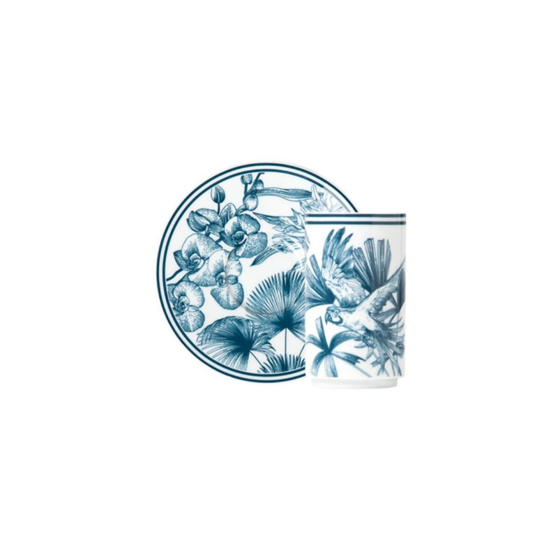 Paraiso Blue cylindrical porcelain espresso cup and saucer with tropical plants, exotic animals, and polished gold star by Sieger by Fürstenberg