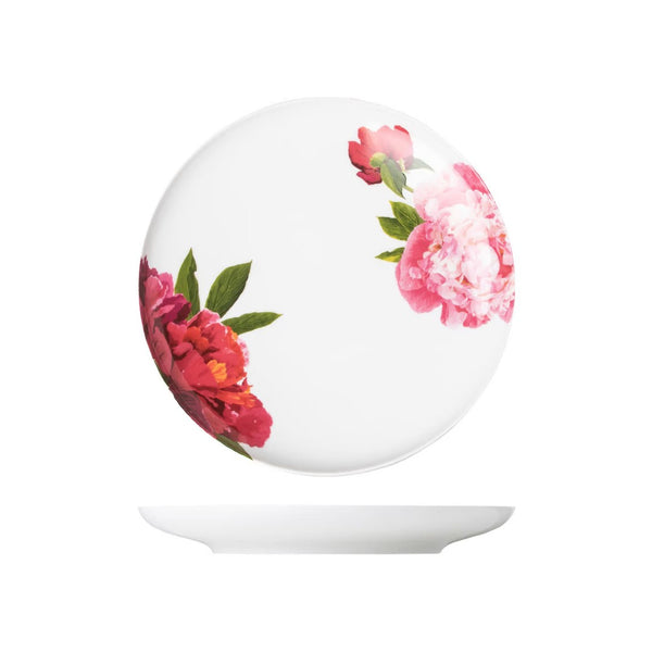 Round white object with pink floral design on a white background