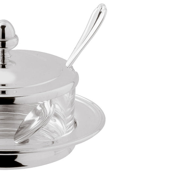 Close-up of Silver-plated Parmesan cheese dish with spoon from the Rencontre collection by Ercuis.