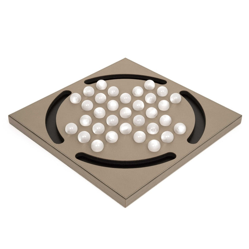 side view of Luxury Peg Solitaire game in taupe grained leather with 33 pearled eco-shell pawns by Pinetti