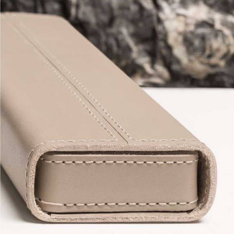 Close-up of a beige leather-bound Leather Pencil Case Etna by Giobagnara x Rabitti in saddle leather