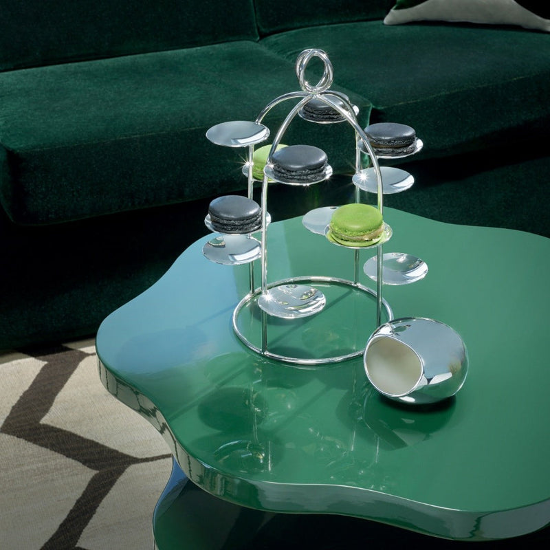 Silver-plated Petit Fours Latitude stand with twelve small dishes by Ercuis, ideal for displaying macarons, chocolates, or petits fours in luxury settings on a green table