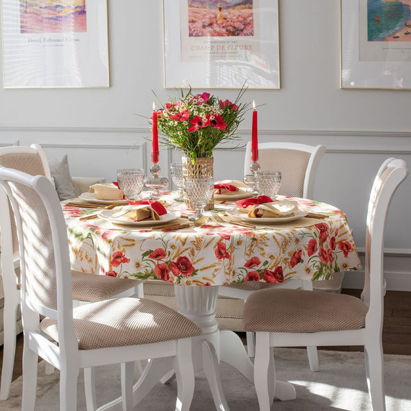 Roseberry Home Poppy round cotton tablecloth with bright red poppy floral design, styled in a dining room