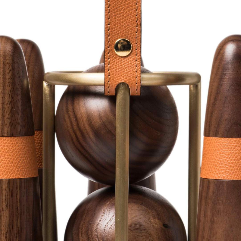 Close-up of Luxury portable bowling set in Canaletto walnut wood with leather and brass details by Pinetti