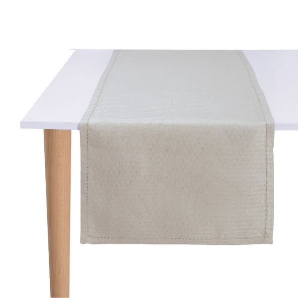 Beige table runner on a white table with wooden legs