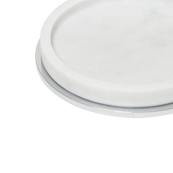close-up Positano marble bottle coaster in Arabescato white by Giobagnara, modern Italian table decor