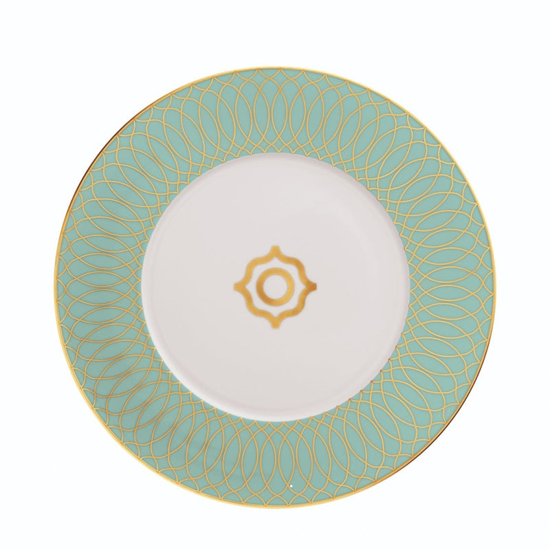 Decorative plate with gold geometric pattern on a white background