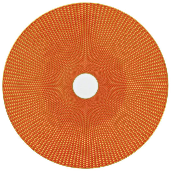 Raynaud Trésor Limoges porcelain presentation plate in vibrant orange with gold-accented honeycomb design