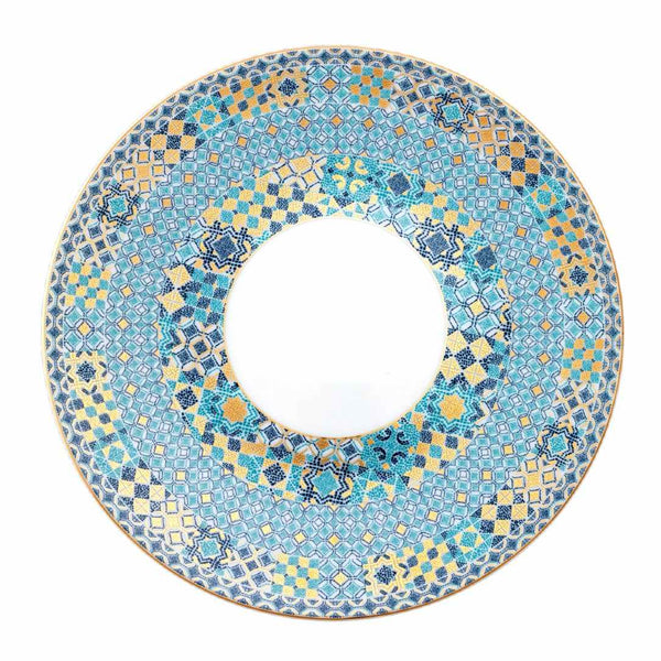 Decorative plate with blue and yellow mosaic pattern on a white background