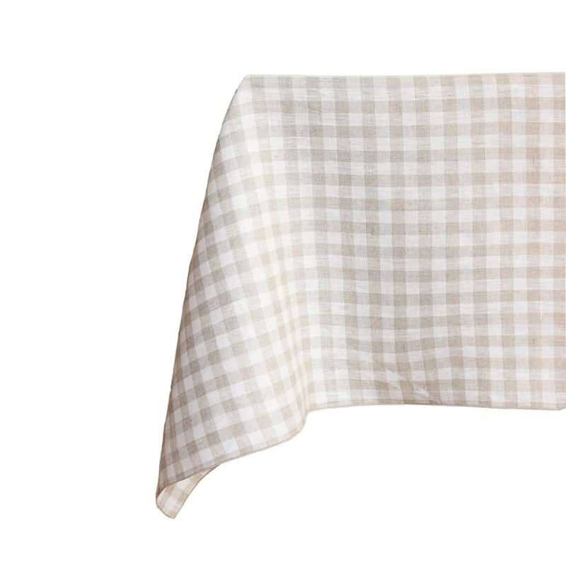 Checkered tablecloth with beige and white pattern on a white background