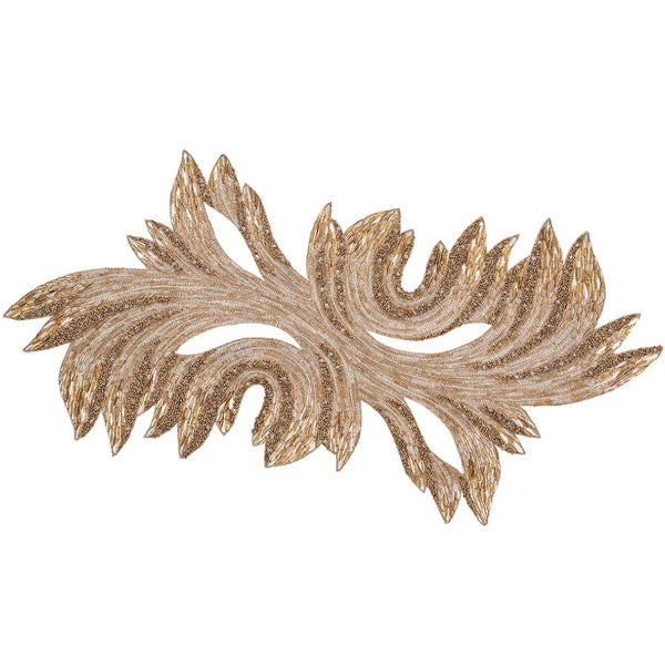 A gold and crystal decorative table runner with an intricate leaf pattern.