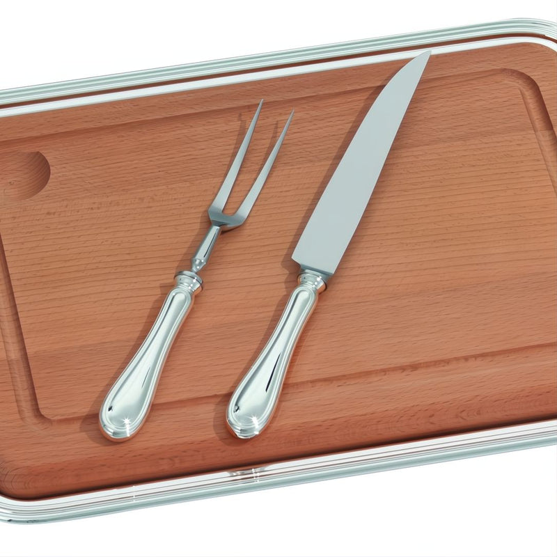 Close-up Rectangular carving tray set by Greggio with wooden board, silver-plated tray, carving knife, and fork 