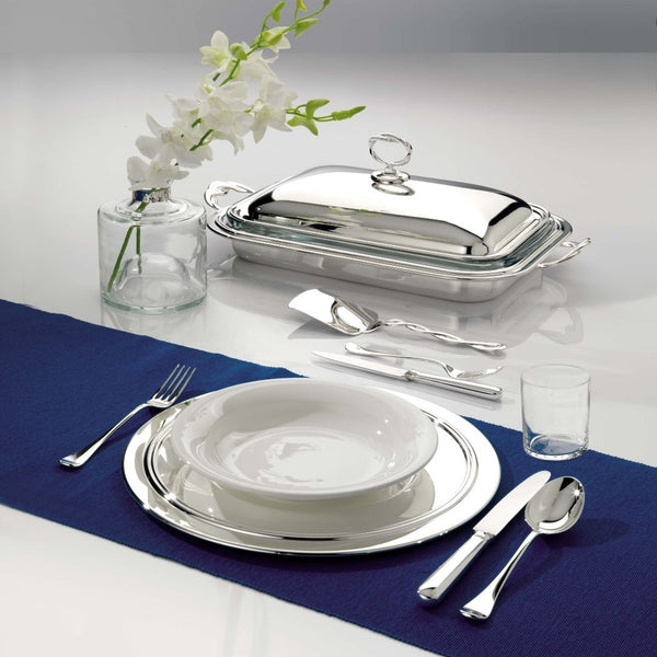 Styled table with Rectangular silver-plated casserole dish with lid and twisted handles from the Villa Pisani collection by Greggio.
