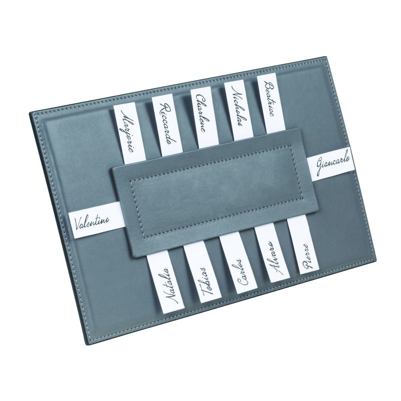 Rectangular Leather Seating Chart Aspen by Giobagnara in grey leather, displaying name cards for elegant table seating arrangements.
