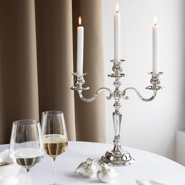 styled table with the Edzard Regina 3-arm candelabra thinly silver-plated with vintage patina effect