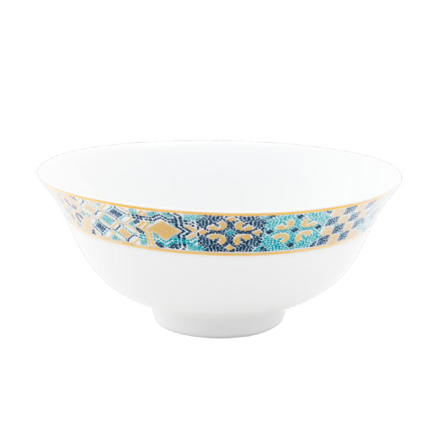 Decorative bowl with a blue and gold pattern on a white background