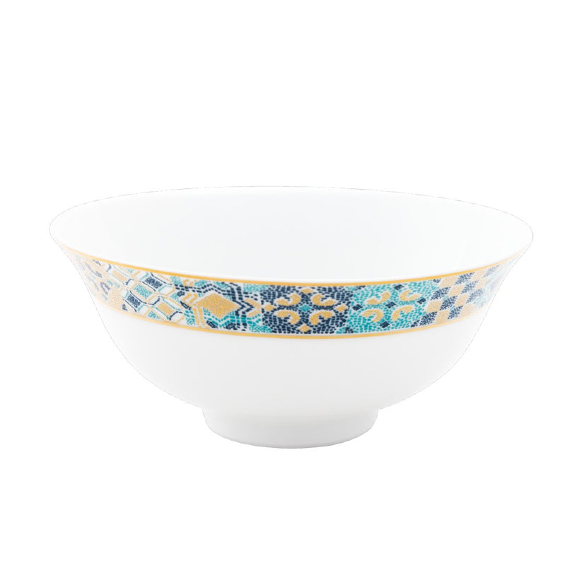 Decorative bowl with a blue and gold pattern on a white background