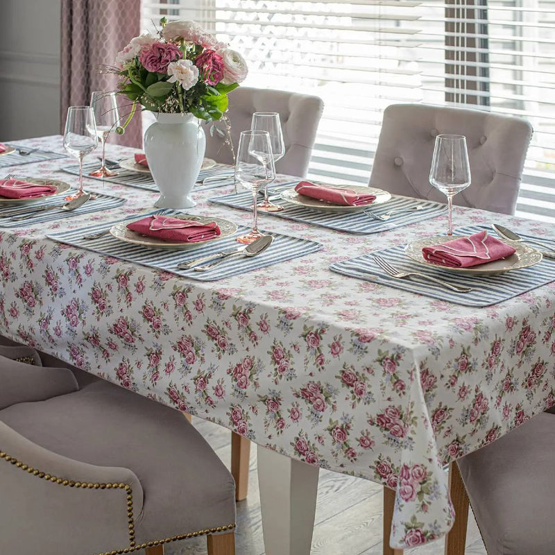Rose Garden cotton tablecloth with floral rose print by Roseberry Home on styled table with plates and flowers