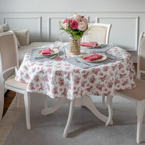 Dining room with round cotton tablecloth with rose garden floral print by Roseberry Home