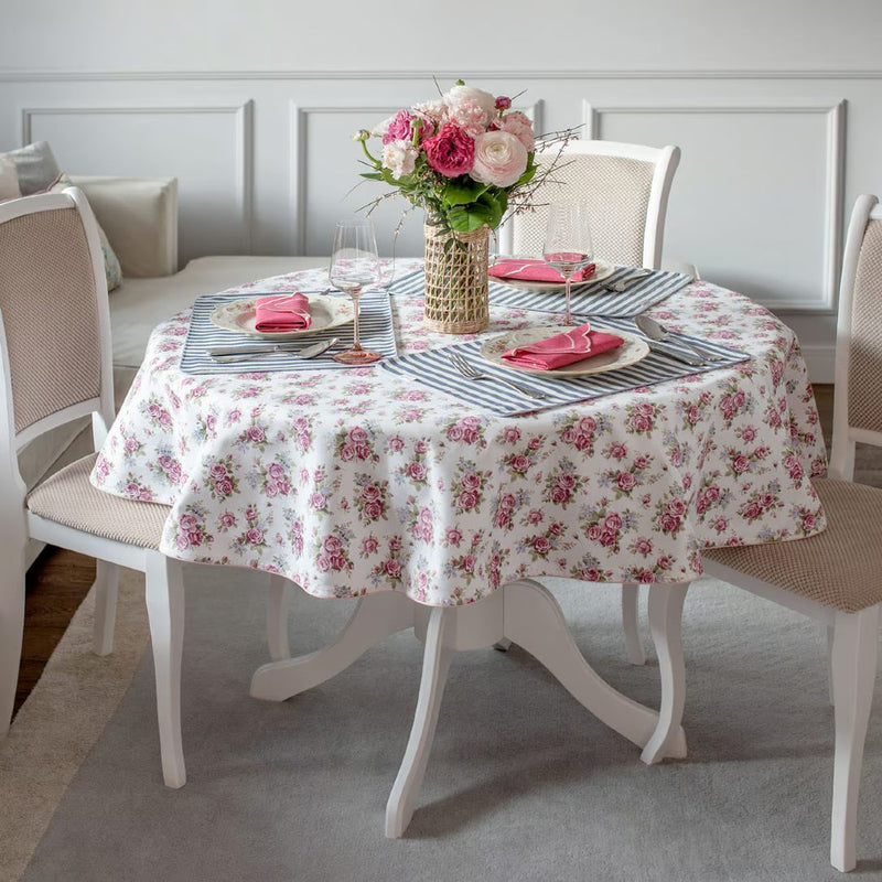 Dining room with round cotton tablecloth with rose garden floral print by Roseberry Home