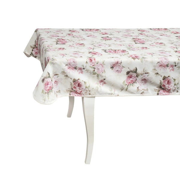Floral patterned tablecloth on a white table with a white background