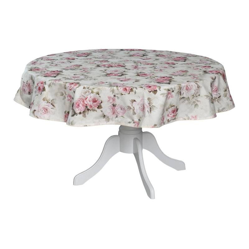 A round cotton tablecloth with a floral rose motif in beige, pink, and multicolor, displayed on a white table stand.