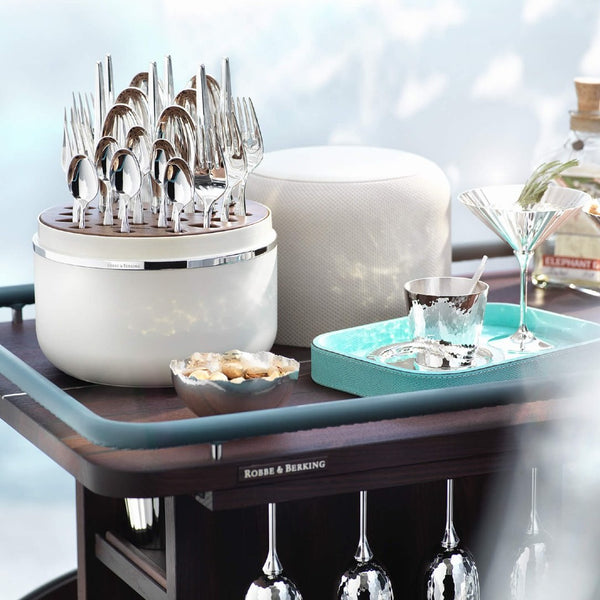 Rosenmuster Crème Box with elegant silver-plated 24 piece cutlery set on luxury serving table.