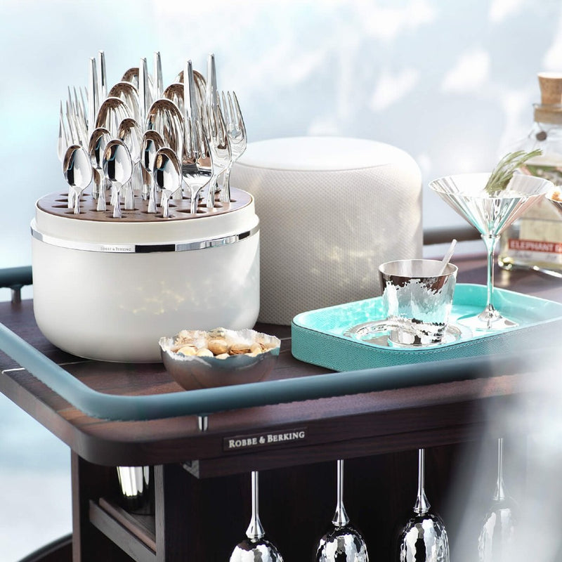 Rosenmuster Crème Box with elegant silver-plated 24 piece cutlery set on luxury serving table.