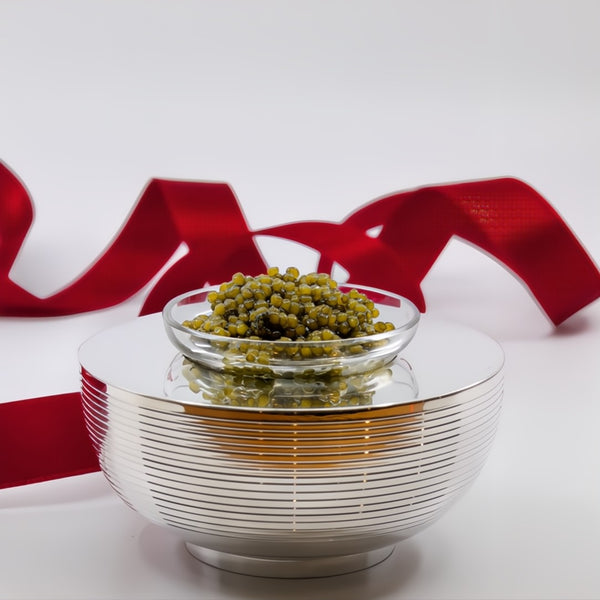 Styled with caviar Round silver-plated caviar cup with ribbed design from the Transat collection by Ercuis