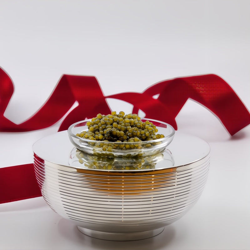 Styled with caviar Round silver-plated caviar cup with ribbed design from the Transat collection by Ercuis