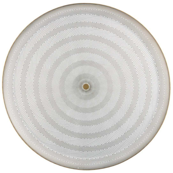 Round large platter in Limoges porcelain with black and gold Bauhaus-inspired geometric design from the Oskar collection by Raynaud.
