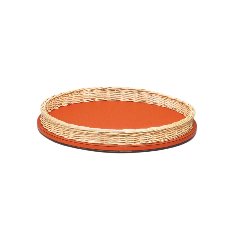 Round orange tray with wicker rim on a white background