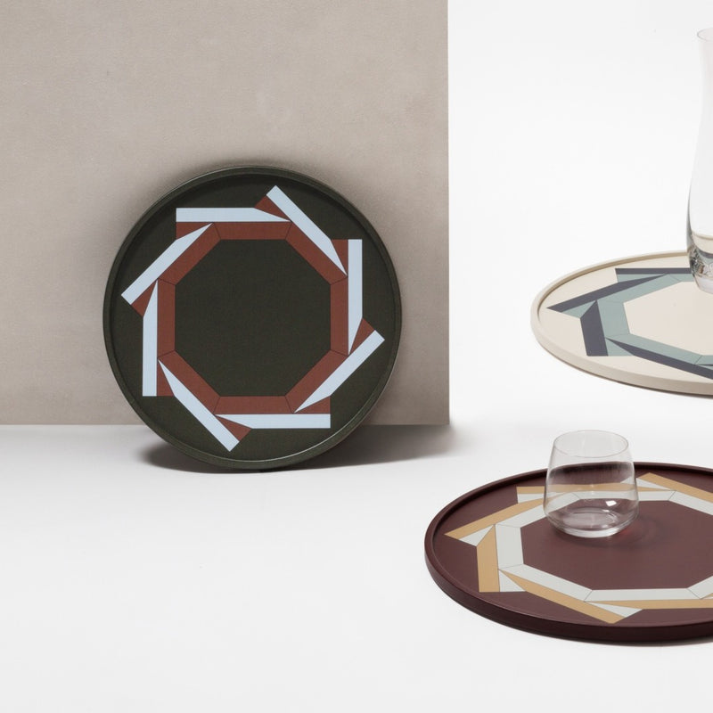 Styled Round Trays San Marco No1 by Giobagnara in leather inspired by Basilica di San Marco floor motif on a neutral background