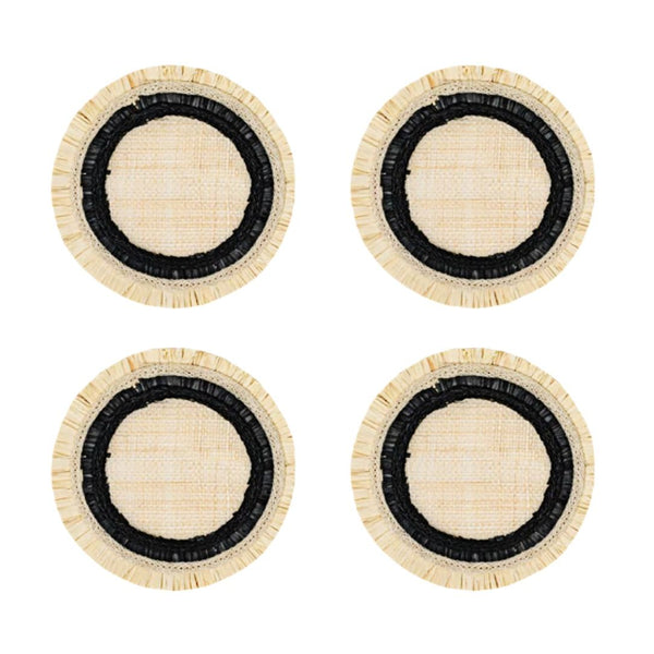 Four round coasters with black centers and beige rims on a white background