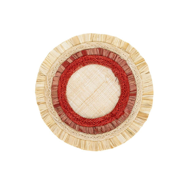 Round woven coaster with red, beige, and white pattern on a white background