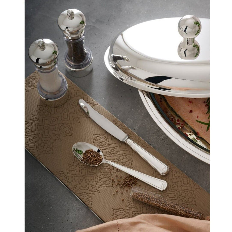 Silver platter with a Salt and Pepper Mills Set Inglese Silver-Plated by Schiavon and decorative mat on a gray surface