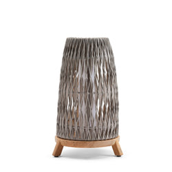 Woven outdoor lamp with wooden base on a white background