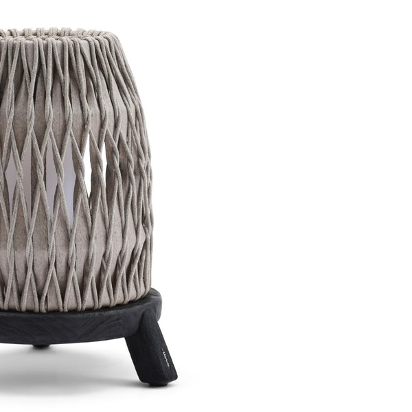 Textured Sandua lantern with woven pattern on a white background