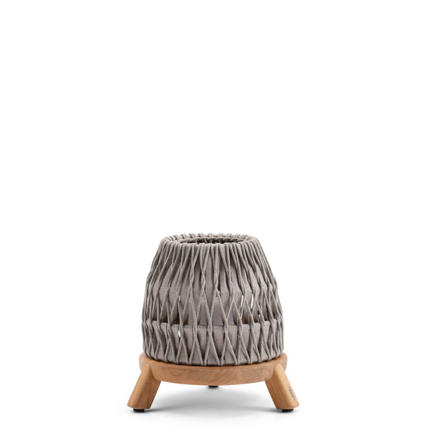 Small stool with textured gray seat and wooden legs on a white background