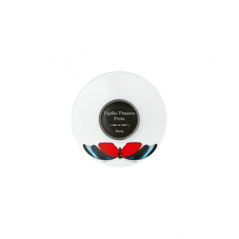 Saucer with butterfly design and 'Papilio Panacee Prola' branding on a white background