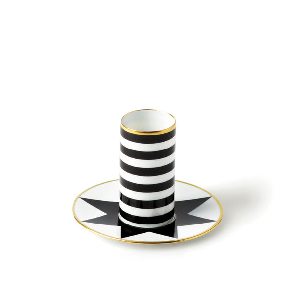 Luxury porcelain cup and espresso saucer with rim decorated with bold black and white star design finished with gold rim from ca d oro sieger furstenbergon a white background