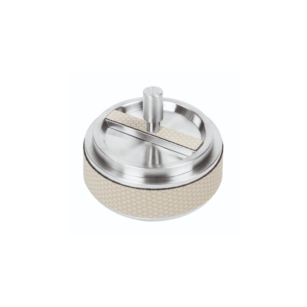 A light grey revolving ashtray with a structure crafted from brushed stainless steel with a satin finish.