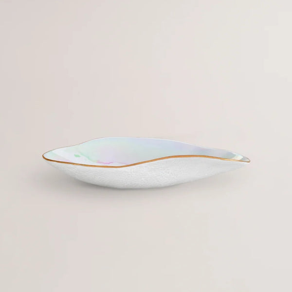 Shell-inspired porcelain side bowls iridescent finish No3 Indulgeon a light beige background