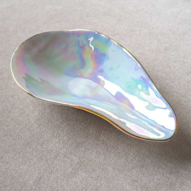 Sculptural porcelain side bowls Pearlescent No3 Indulge Sarah-Linda on a gray fabric background