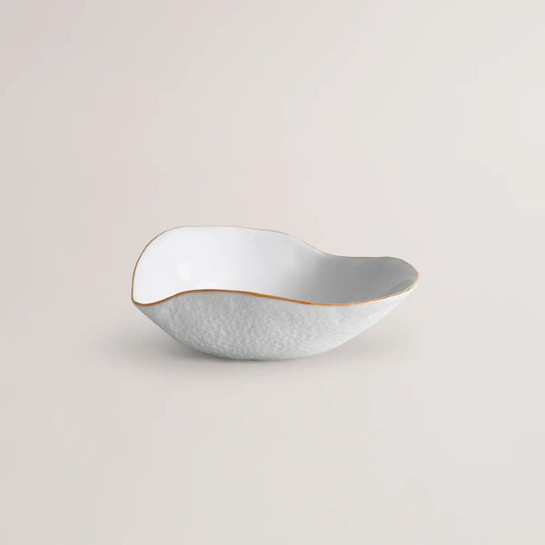Shell-inspired porcelain bowls with golden rim Nº2 Indulge Sarah-Linda on a light beige background