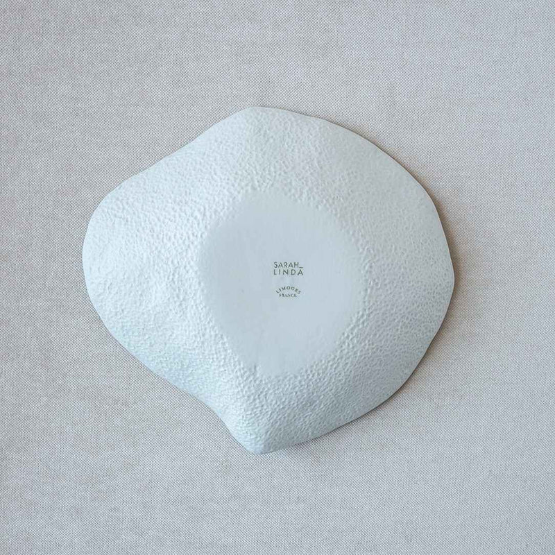 Back of the Sculptural porcelain small plates Blue Lagoon No5 Indulge Sarah-Lindaon a light gray background